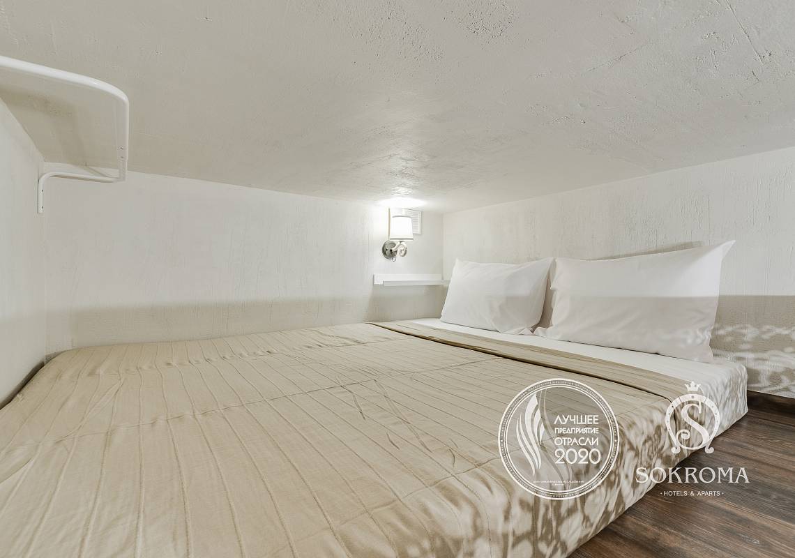 фото двуспальной кровати на втором уровне